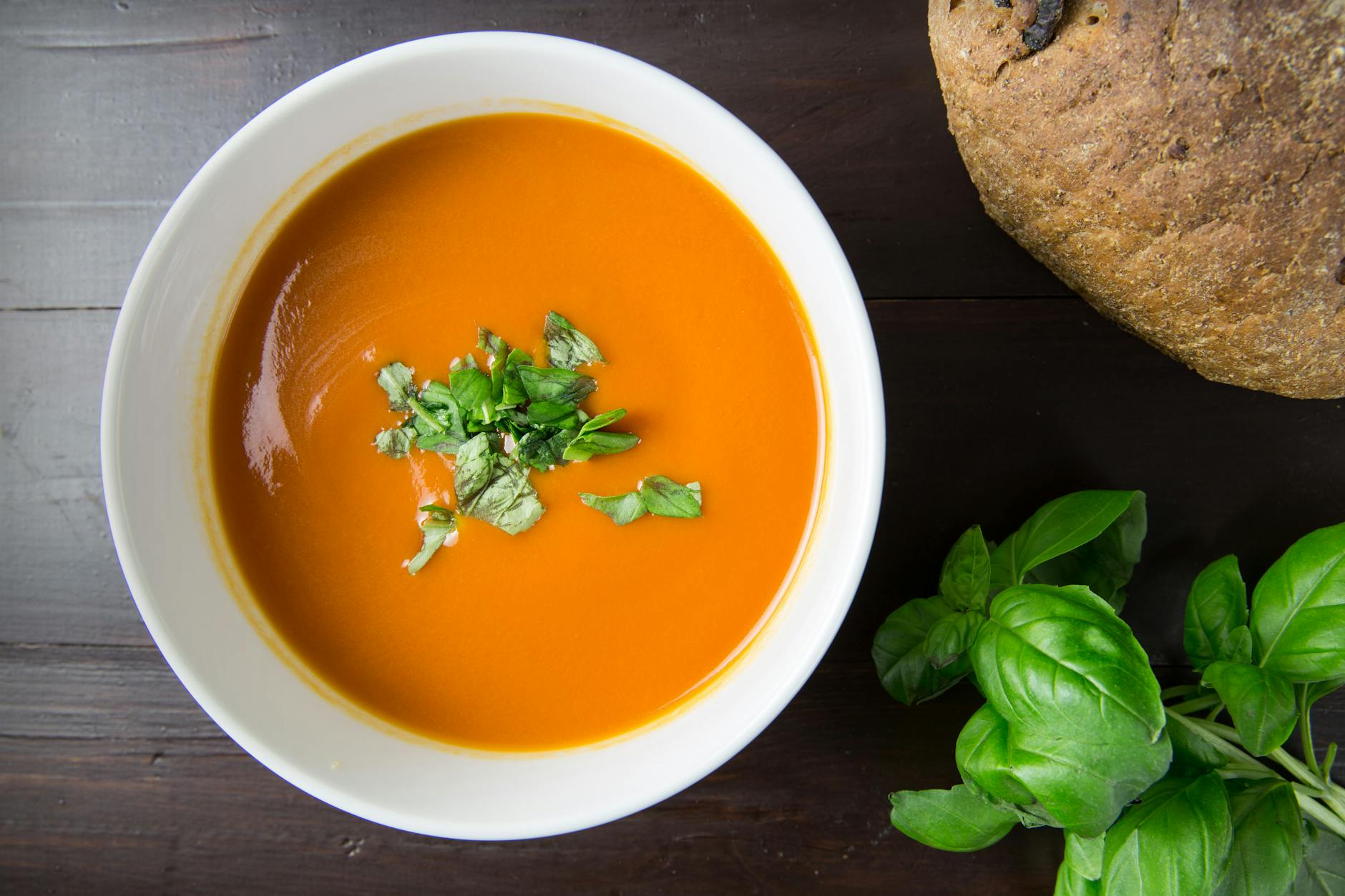 brown soup in white ceramic bowl